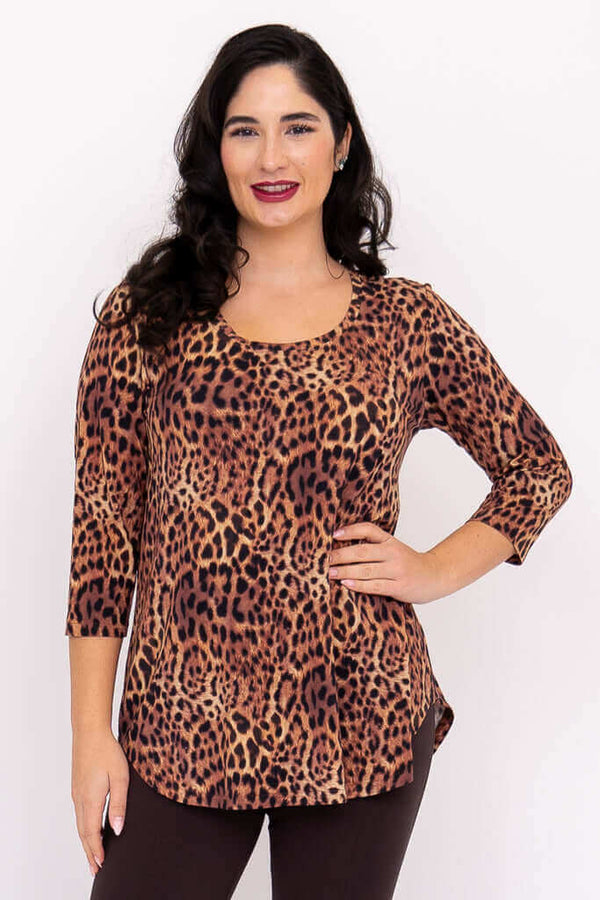 Front view of a woman wearing a leopard print 3/4 sleeve bamboo top