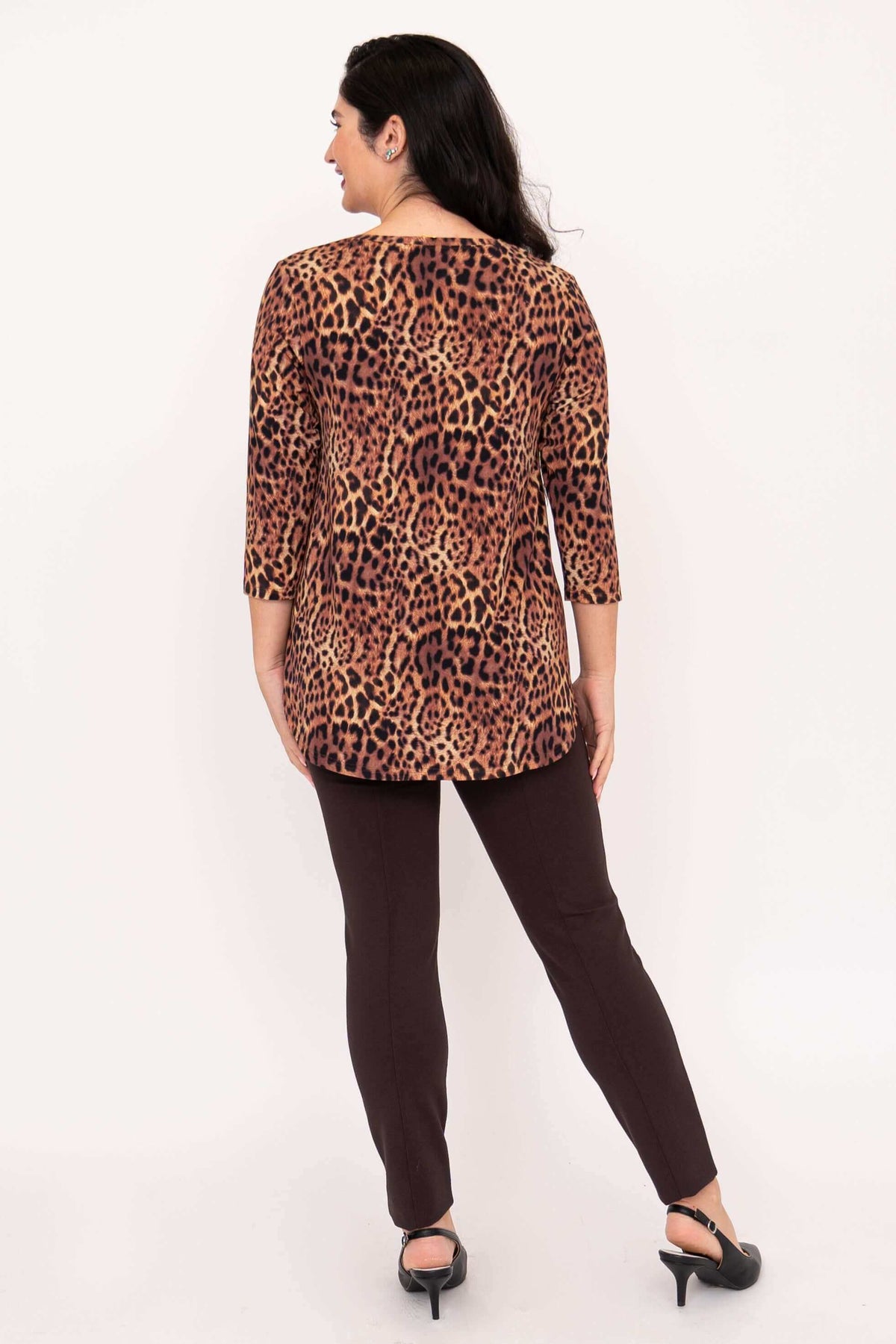Back view of a woman wearing a leopard print 3/4 sleeve bamboo top