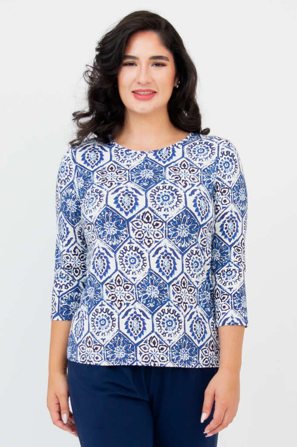 Front view of woman wearing blue mosaic 3/4 sleeve fitted tee