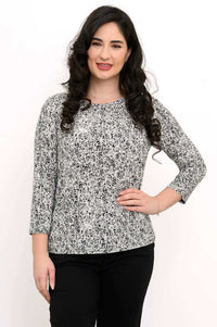 Woman wearing black and white rose print 3/4 sleeve tee, front view