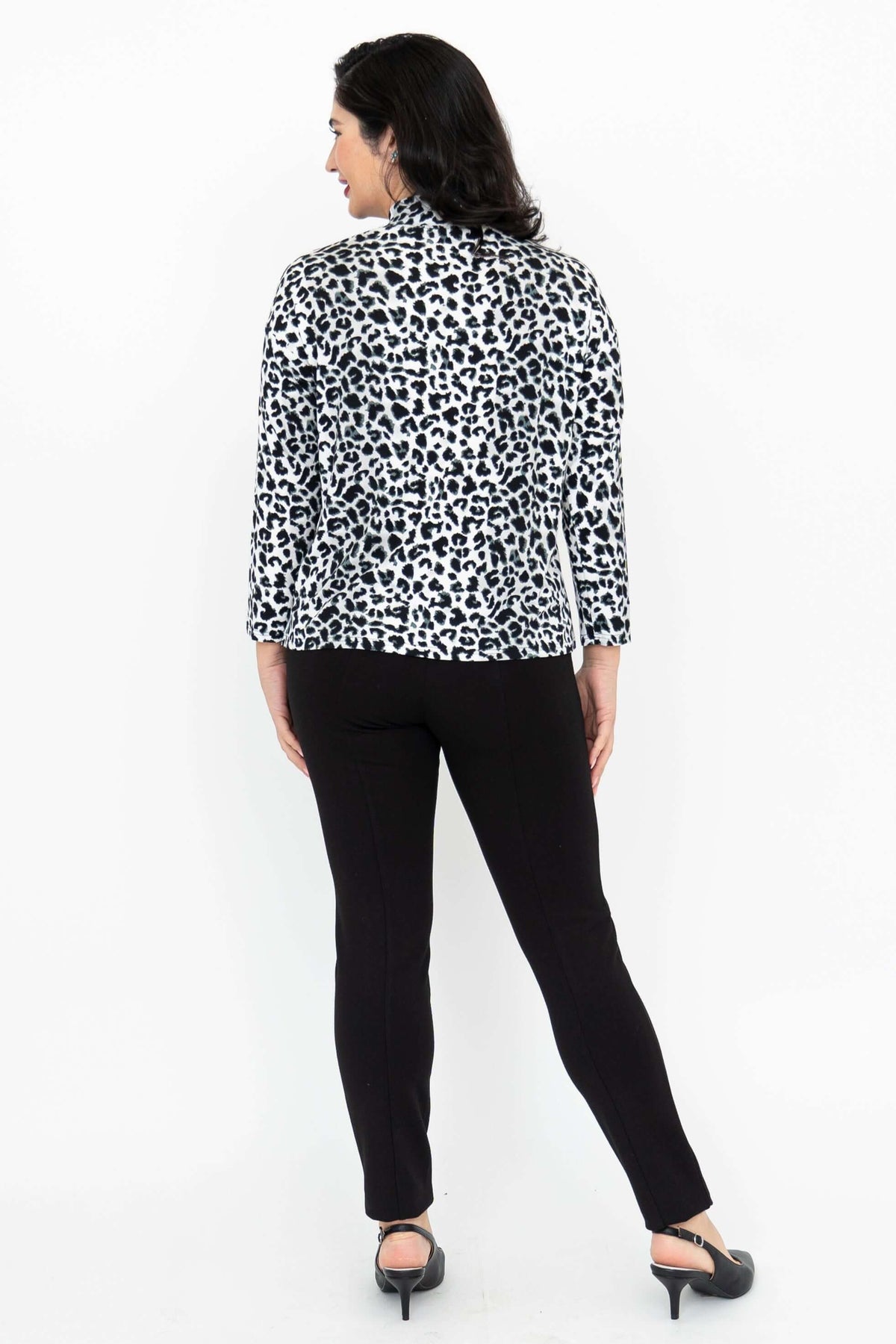 Back view of woman wearing leopard print mock neck 3/4 sleeve top