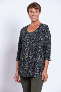 Three-quarter front view of woman in Jazz 3/4 sleeve bamboo top, floral print