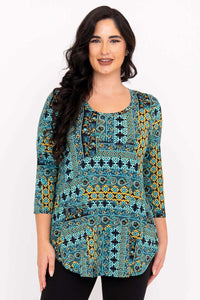 Woman wearing a turquoise mosaic print 3/4 sleeve bamboo top, front view