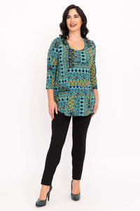 Woman wearing turquoise mosaic bamboo top with 3/4 sleeves, full front view