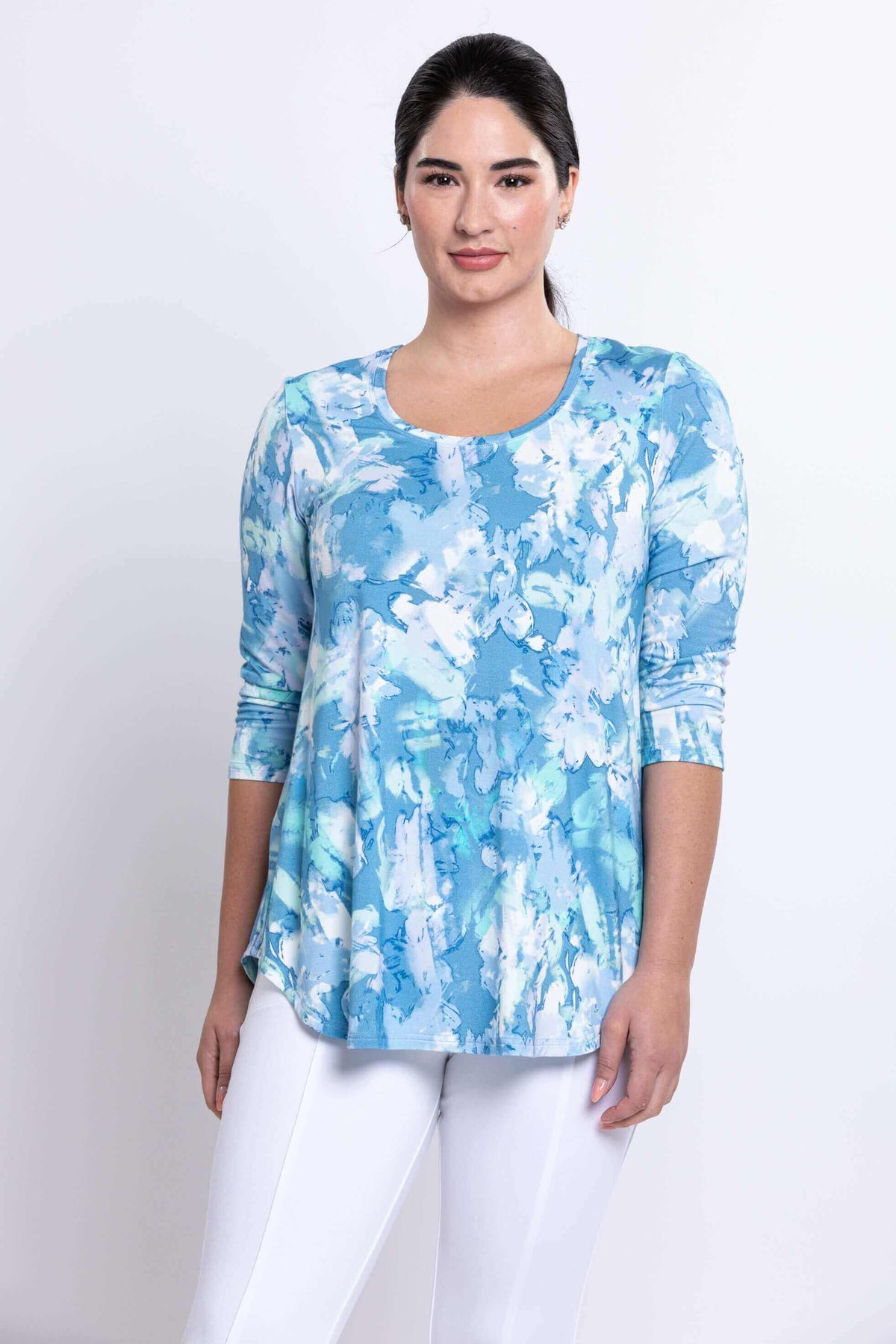 Front view of model wearing a blue watercolor bamboo top with 3/4 sleeves