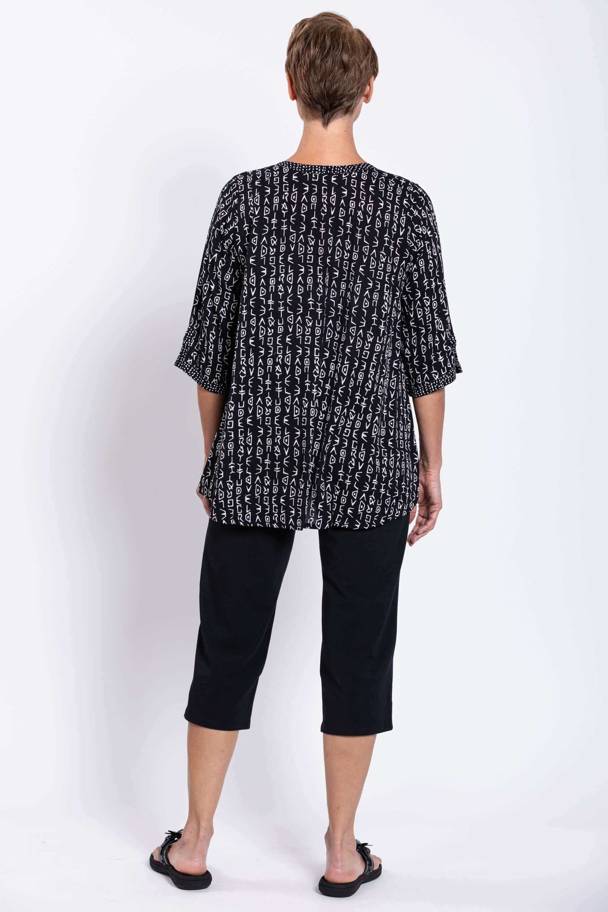 Back view of the Palace Blouse highlighting the flowy silhouette and sleeve detailing