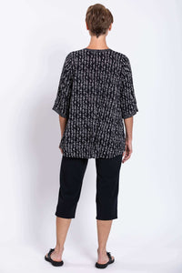 Back view of the Palace Blouse highlighting the flowy silhouette and sleeve detailing