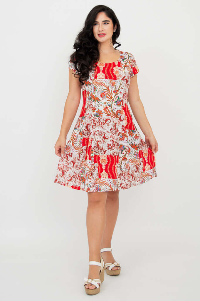 Anna dress on model, red paisley fabric, front twirl pose