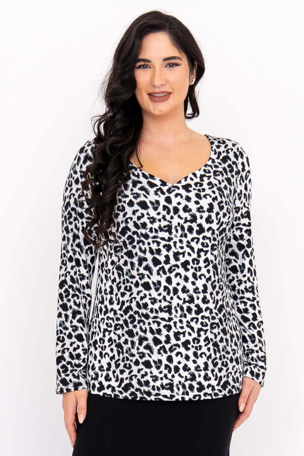 Front view of model wearing Annette leopard print long sleeve top