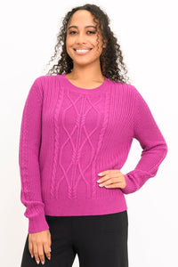 Women's long-sleeve knit top in a vibrant rose-pink hue with a round neck, styled against a white backdrop.