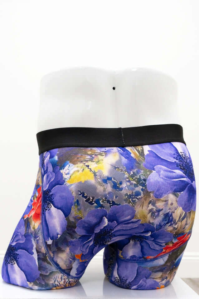 Back angle view of men's floral bamboo boxer briefs displaying detailed print