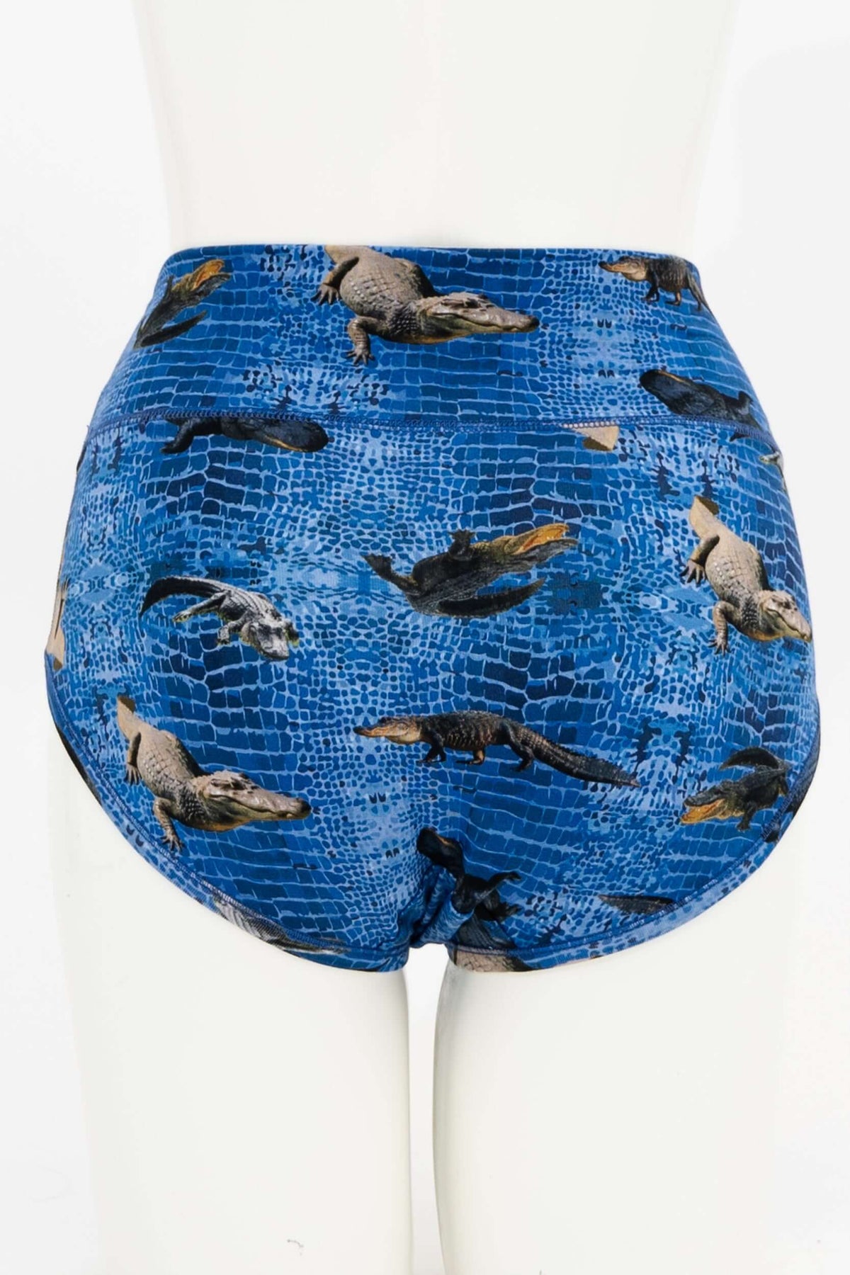 Back view of blue high-waisted brief featuring crocodile pattern