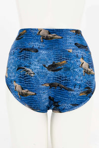 Back view of blue high-waisted brief featuring crocodile pattern