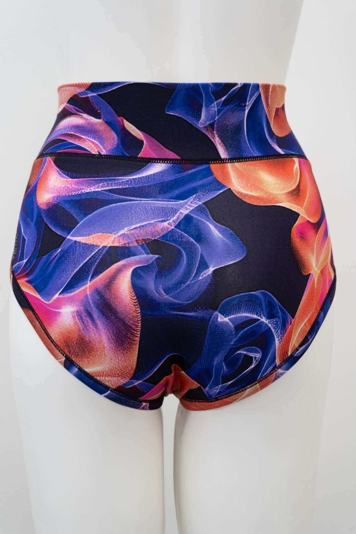 Back view of high-waisted brief featuring bold swirl design