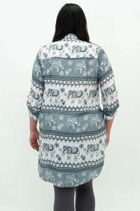 Back view of model wearing Queenie Elephant Tunic Top showcasing high-low hemline