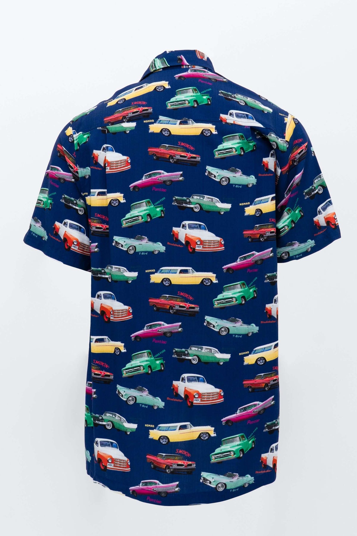 Back view of button-up shirt showcasing full retro cars pattern on a navy background