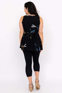 Back view of woman in black batik tank top showing adjustable ties and colorful pattern