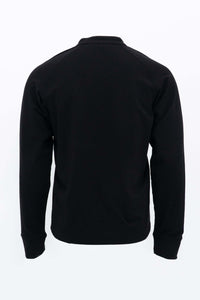 Back view of a black long sleeve Henley shirt
