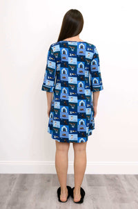 Rear view of woman in blue dog print sleepshirt showing relaxed fit