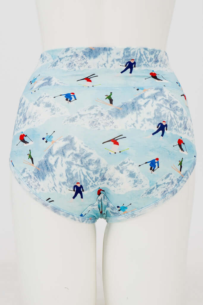 Back view of high-waisted bamboo briefs with ski print on a mannequin