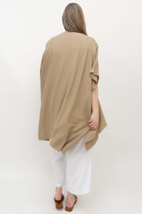 Back view of model wearing Darcy kimono wrap in sand