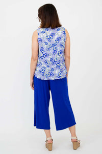 Back view of model showing full length and peplum hem of Ginny Tank