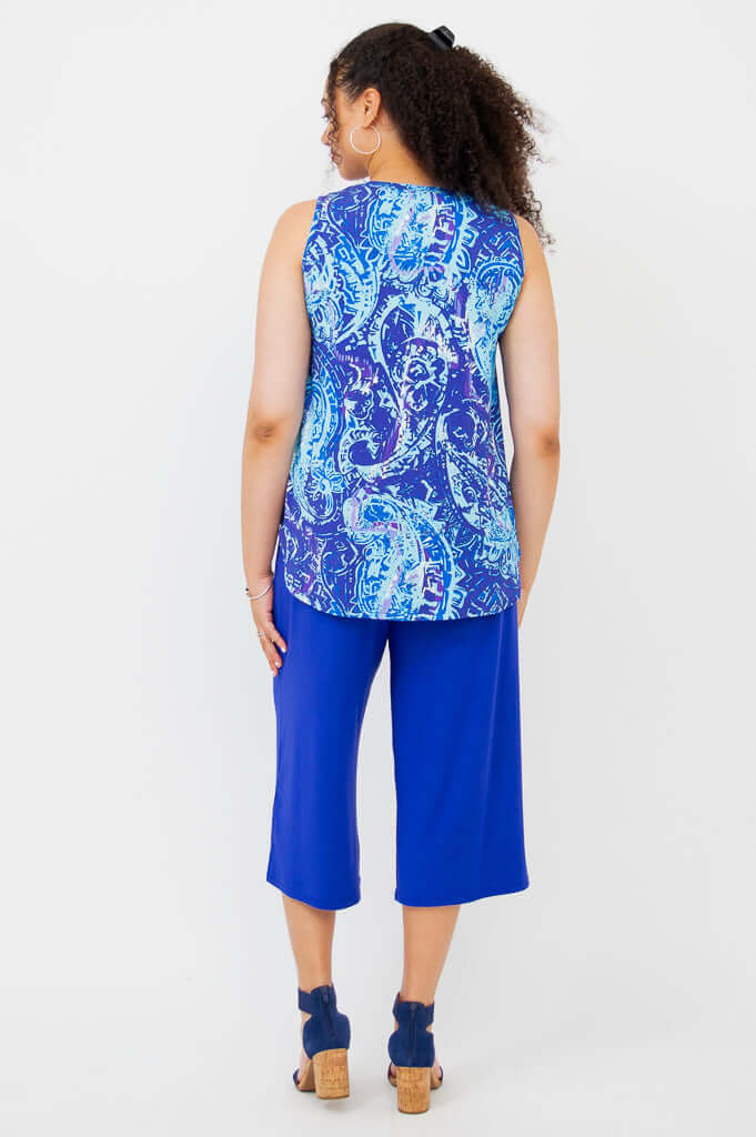 Back view of woman wearing a blue paisley print bamboo tank top