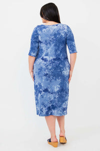 Back view of woman wearing blue tie dye bamboo dress with elbow length sleeves