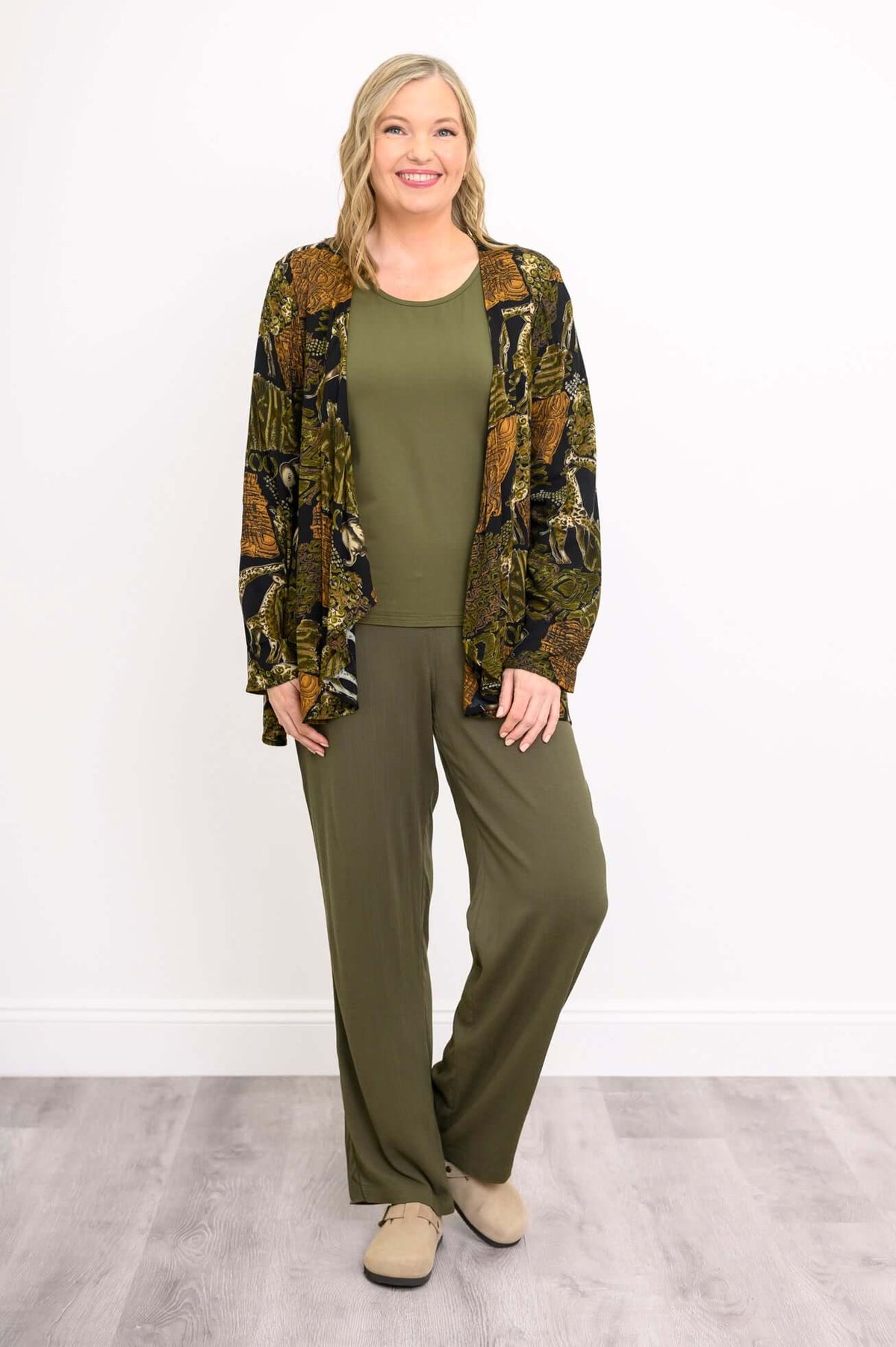 Rear view of the Toucan Jungle Jacket showcasing its jungle animal print
