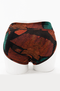 Back view of hipster underwear in autumn leaf print on mannequin