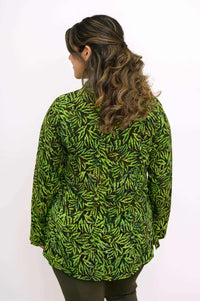 Back view of model in green leaf print Cindy shirt, highlighting shirt details