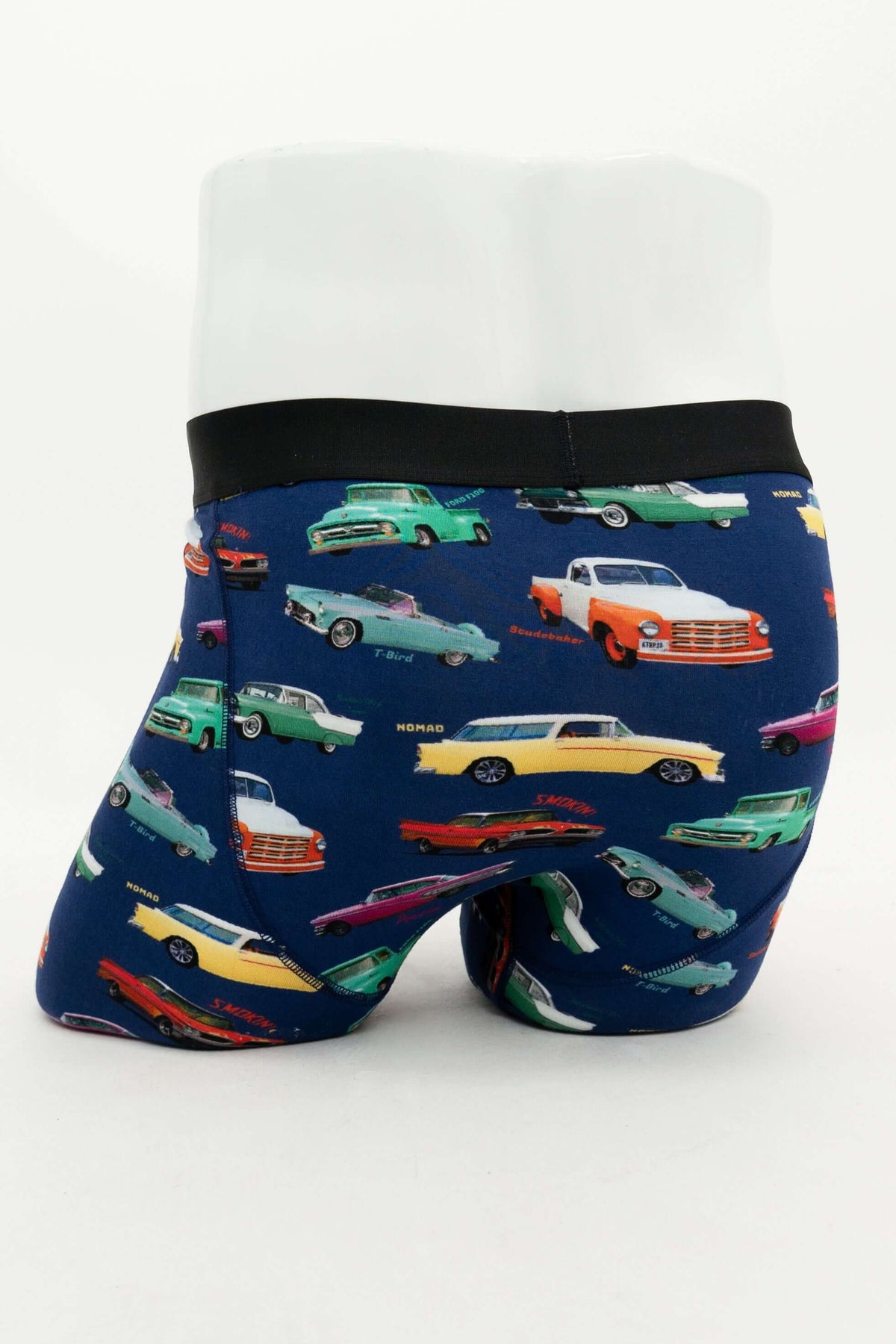 Back view of men's boxer briefs with vibrant classic car pattern