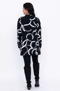 Back view of Edwina tunic showing all-over abstract pattern in white and grey.
