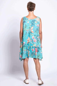 Back view of Gia Dress highlighting ruffle detail and floral pattern