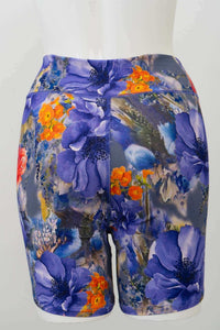 Back view of Hallie Bamboo Shorts with striking blue, orange, and red flower patterns