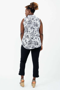 Back view of model wearing Hula tank showing allover print and curved hem