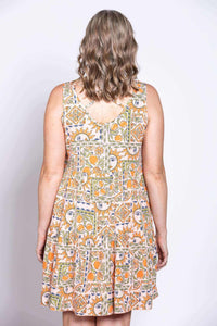 Back view of Kaya dress showing criss cross detail and patterned fabric