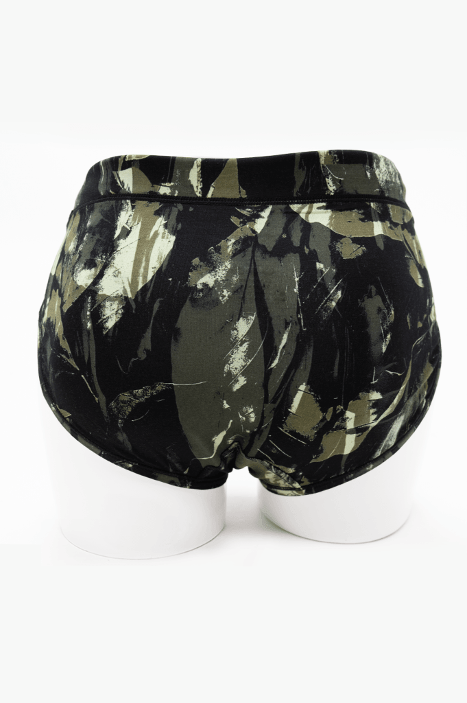 Back view of La Gaunche Bamboo Brief in olive camo print on mannequin