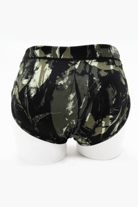 Back view of La Gaunche Bamboo Brief in olive camo print on mannequin