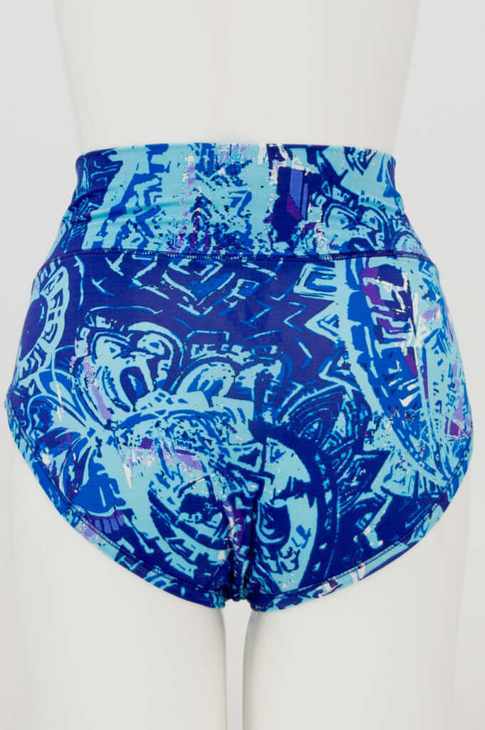 Back view of La Gaunche Classic Brief in blue mosaic print on mannequin