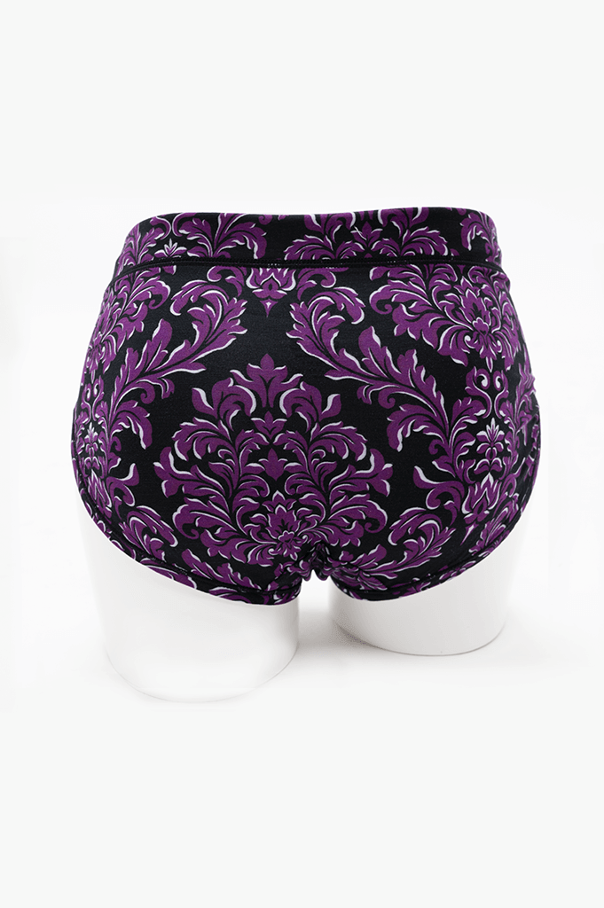 Back view of La Gaunche bamboo brief in purple and black damask pattern
