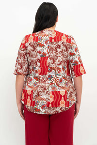 Back view of Liza paisley patchwork blouse showcasing shirt tail hemline