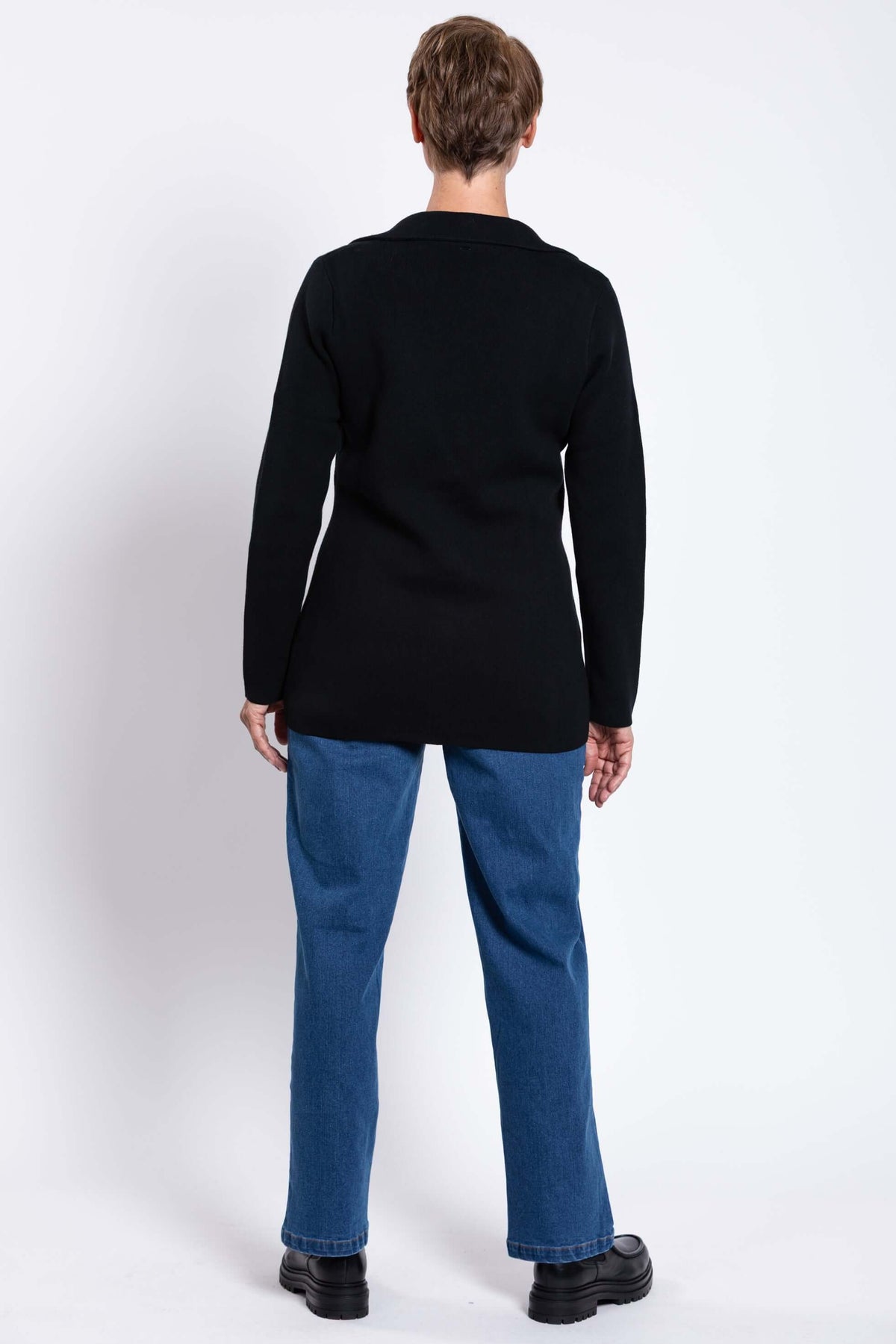 Rear view of the Margaret Jacket showing its length and straight hem
