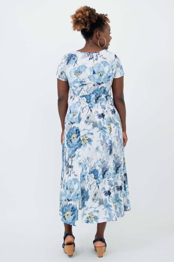 Back view of the Morgan dress in blue and white watercolor floral print