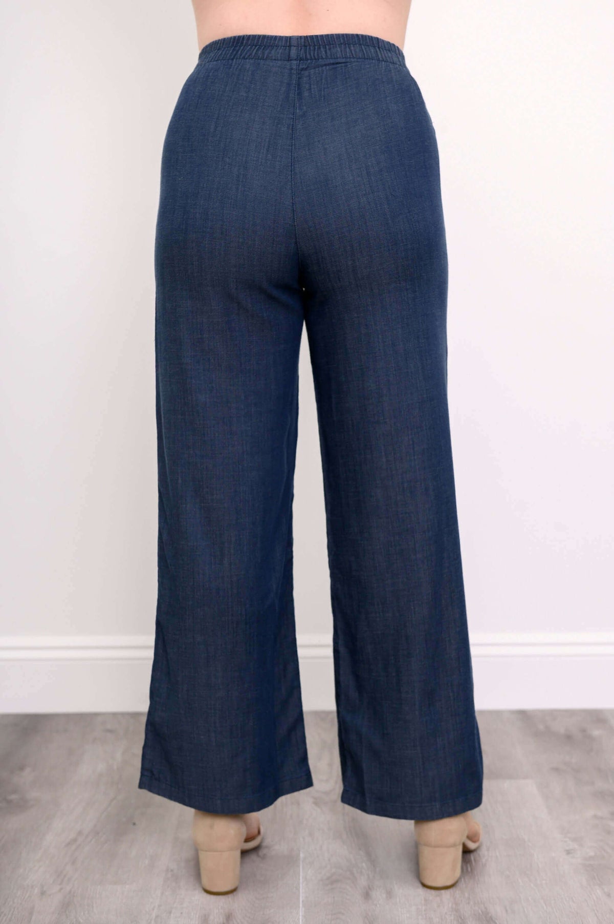 Back view of Parker wide leg tencel pants showing elastic waistband and flowy fit