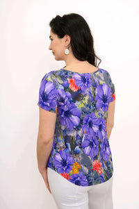 Back view of Ritzy Sweetheart Top displaying full floral pattern and relaxed fit