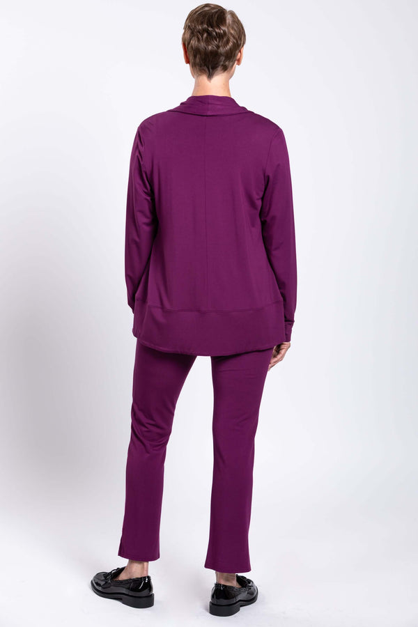 Back view of model showcasing plum bamboo pants and matching cardigan