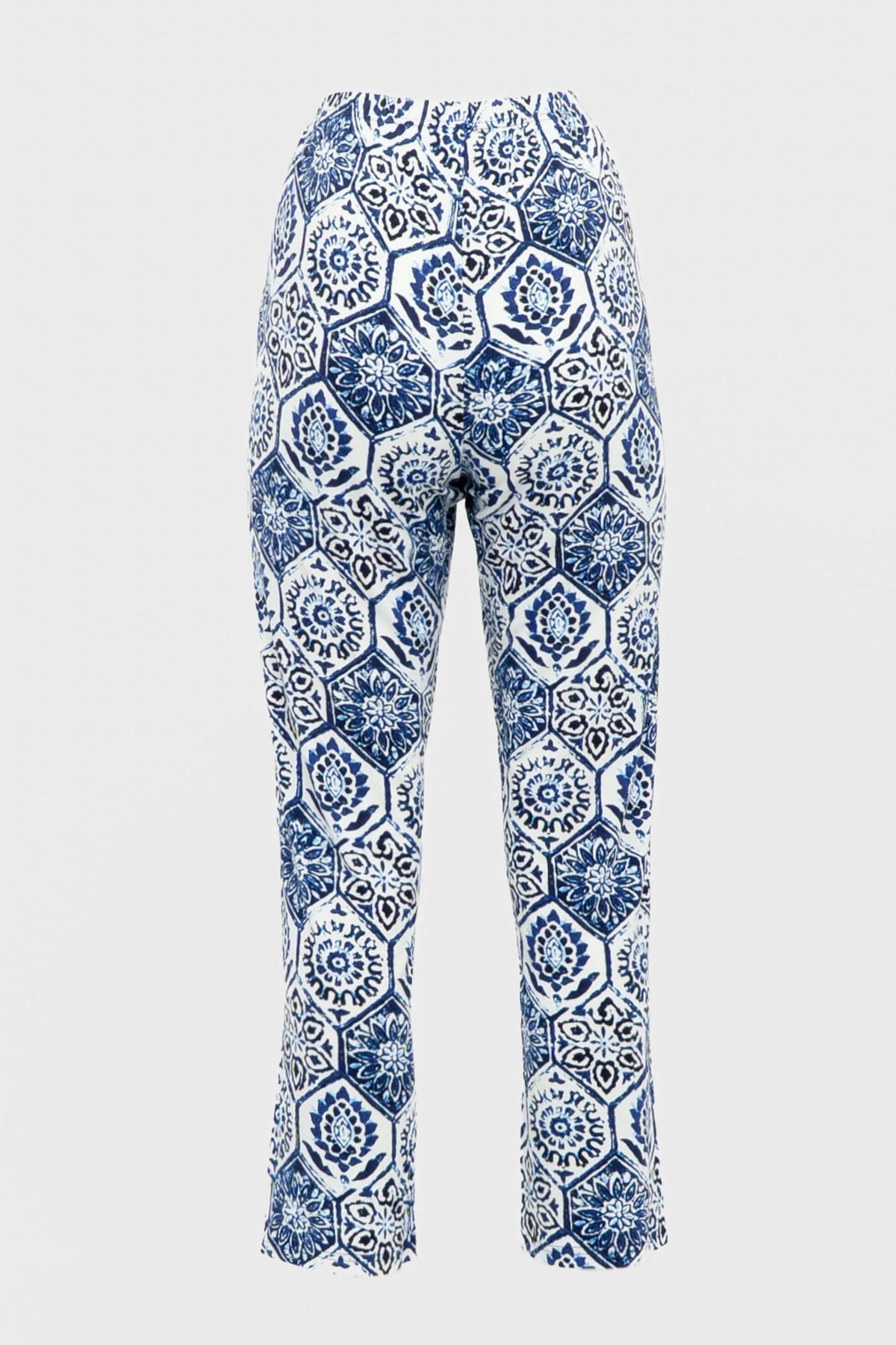Back view of blue and white printed slim fit pants on plain background