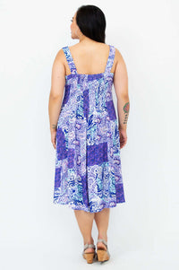 Back view of woman modeling Shauna midi dress with shirred bodice
