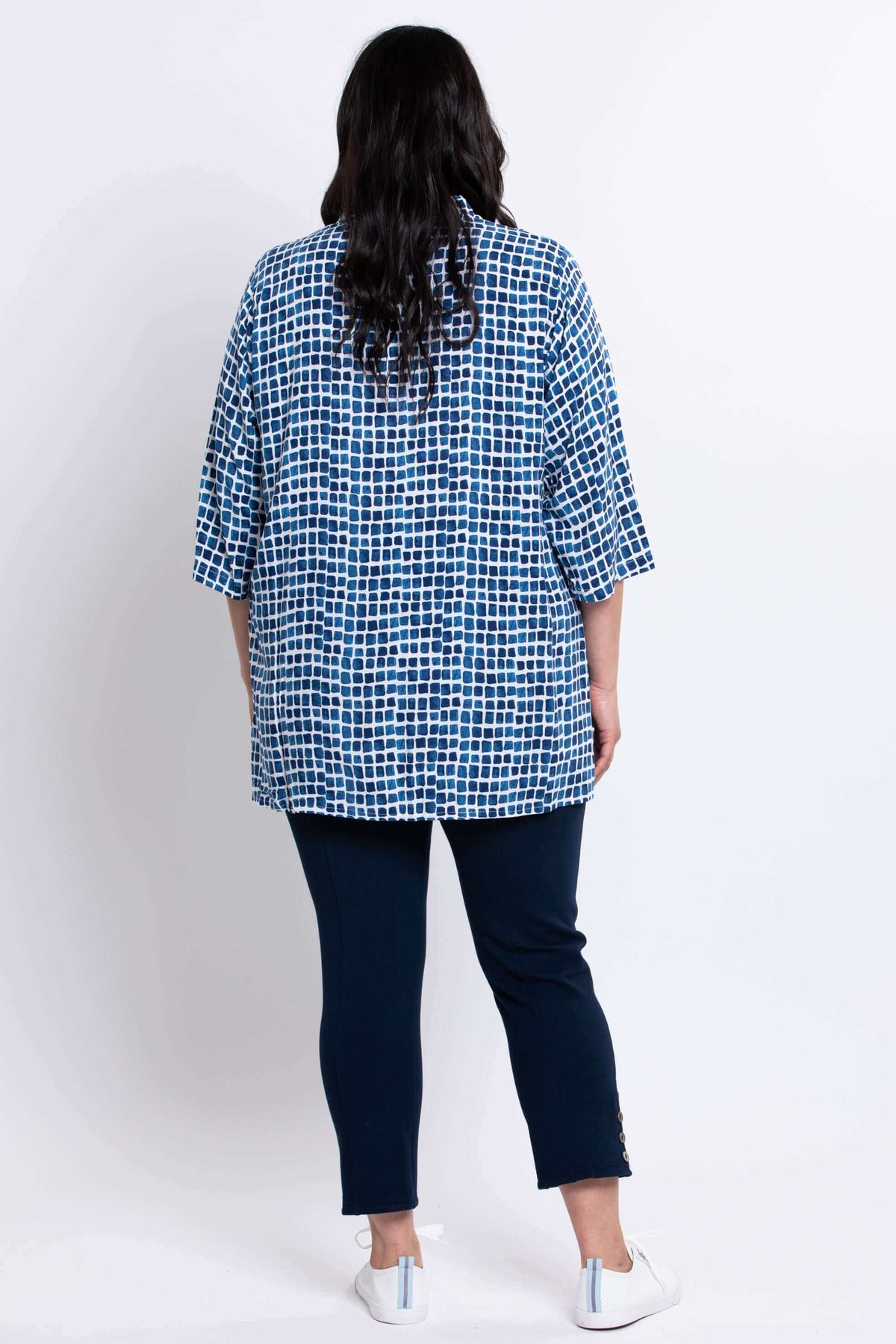 Back view of model wearing blue batik Shirley blouse